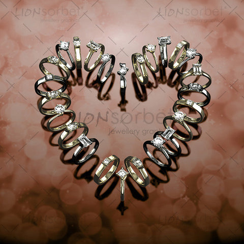 Image of engagement rings making a heart shape