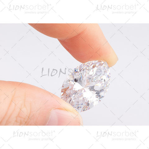 marquise diamond held in fingers