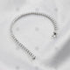 Tennis bracelet on white silk - NC1001