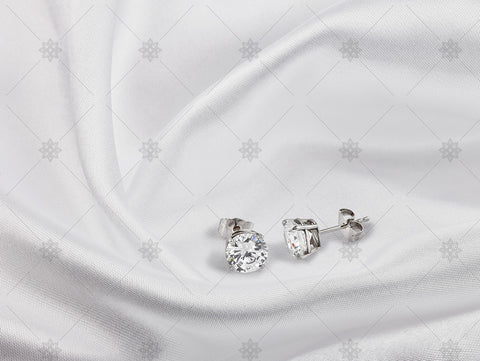 Diamond Stud earrings on white silk - NC1006