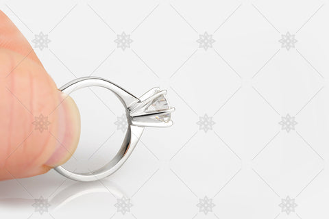 White Gold Engagement Ring between fingers - NE1014
